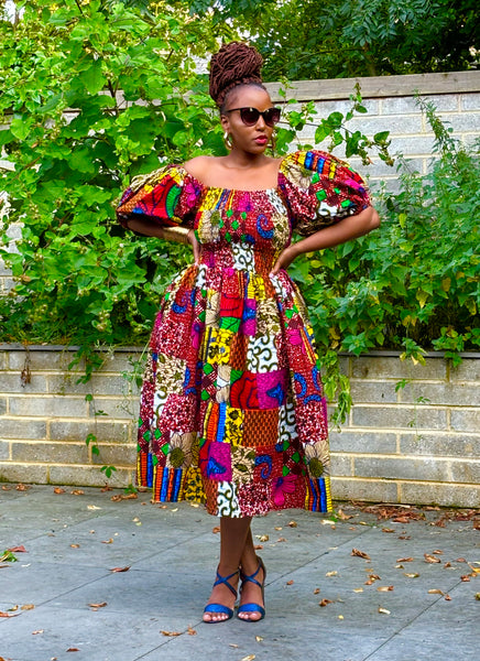 Nante mixed print statement sleeve dress.