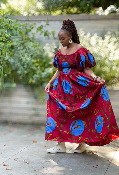 Tamara statement full dress with puff sleeves.