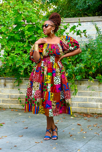 Nante mixed print statement sleeve dress.