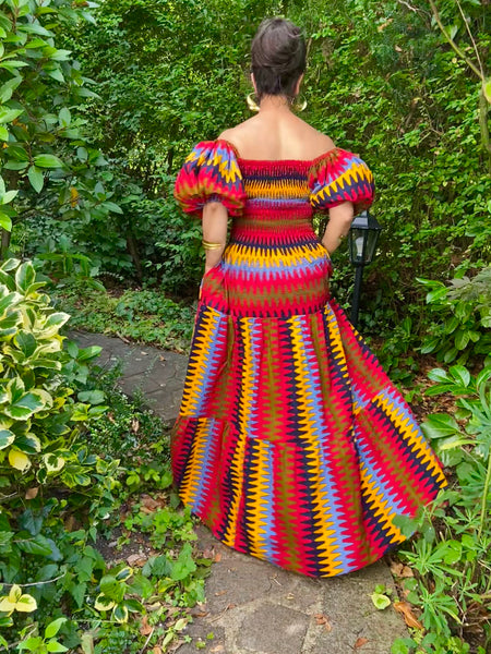 JAFFE smocked dress with  puff sleeves in red.