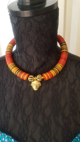 African beaded necklace with bronze African mask pendant