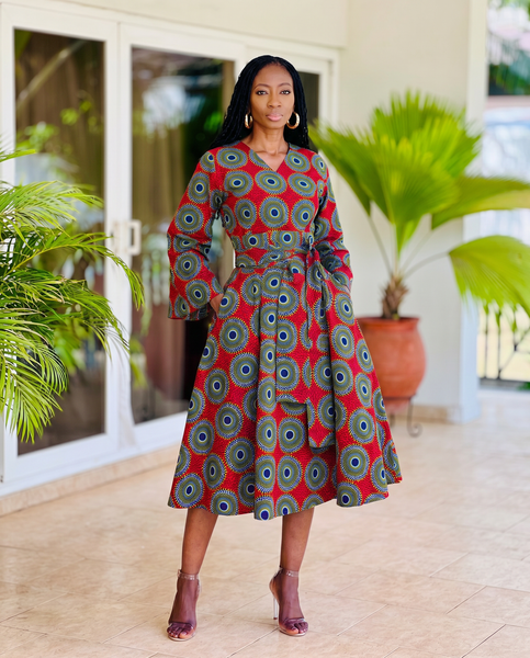 Mina Flared sleeve belted dress in a geometric print.