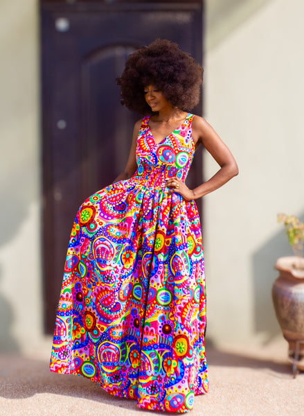 Fatu full skirt dress in multicoloured abstract pattern.