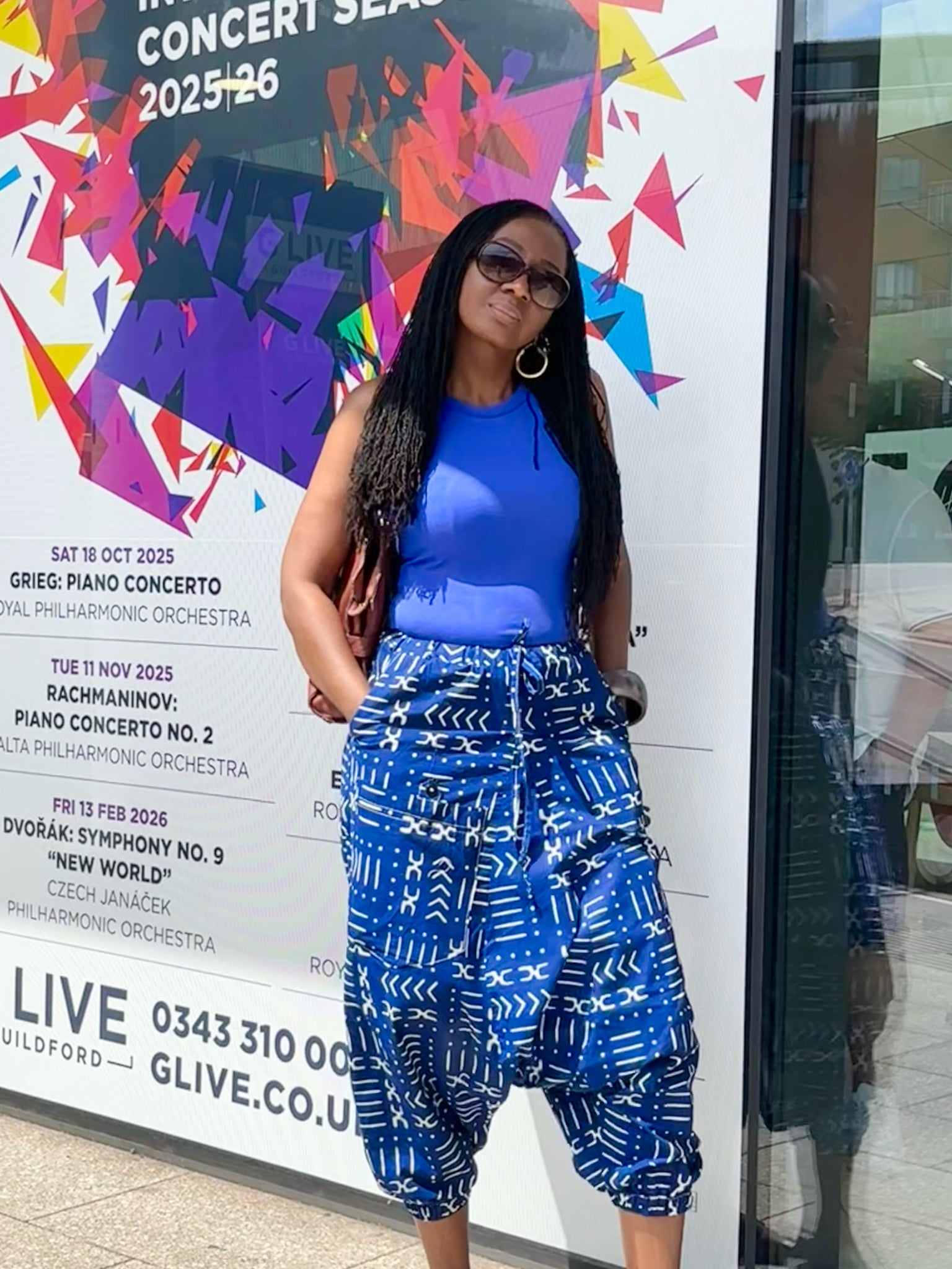 Harem pants in a geometric blue and white African print.