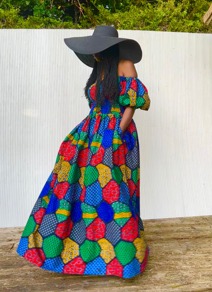 Jaffa statement sleeve maxi dress in a vibrant geometric print.