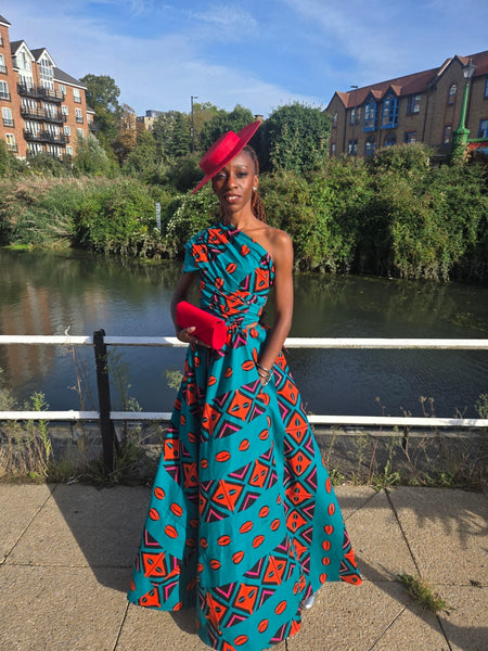 Fula free size palazzo infinity jumpsuit in green and red Aztec print.