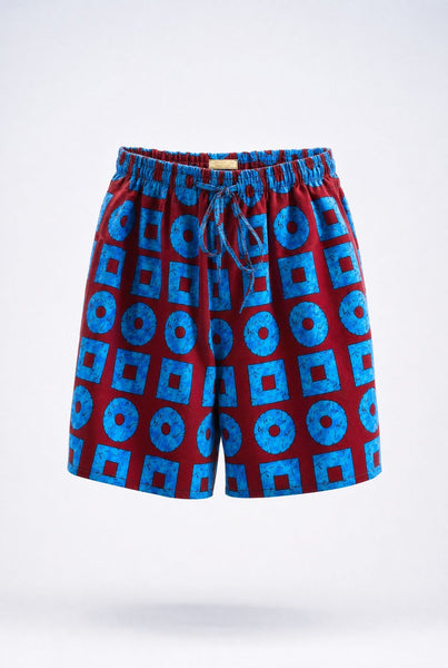 Wide leg shorts in a contemporary geometric African print in turquoise and wine.