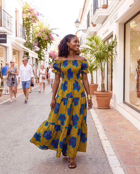 Tande peasant inspired smocked maxi dress.