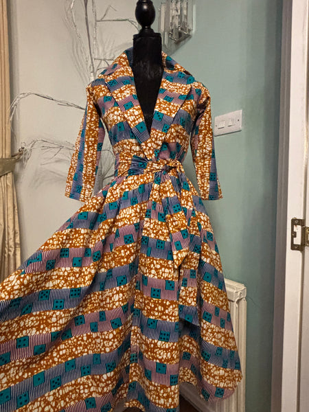 Kayla 50’s shirt style dress in a contemporary geometric African print.