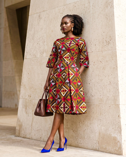 Rabi African print box pleat three quarter length sleeve dress.