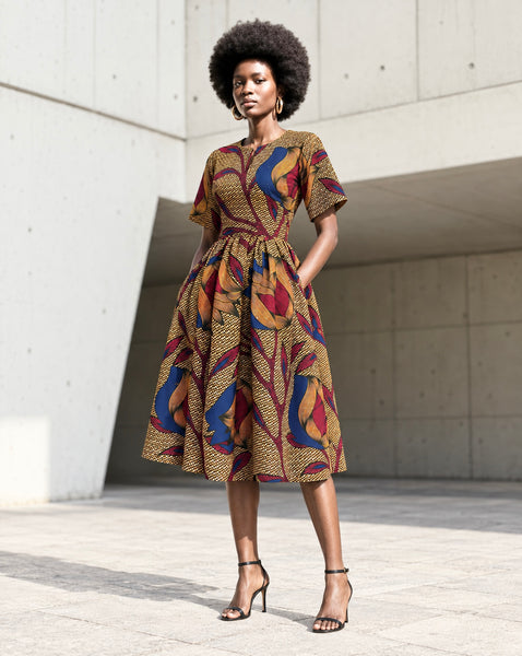 Bini full skirt dress in a leafy floral African print.