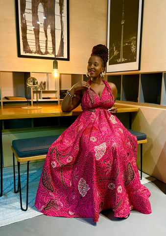 Free size infinity midaxi dress in a fuschia floral African print.