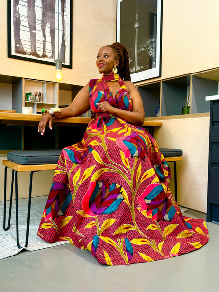 Infinity freesize maxi dress in a bold multicoloured floral Print. House of Afrika