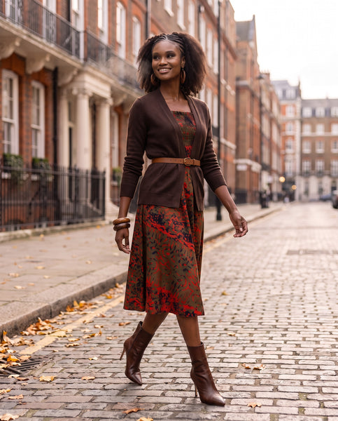Yiko cut out dress in red and brown hues.