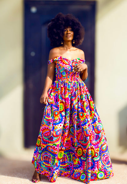 Fatu full skirt dress in multicoloured abstract pattern.