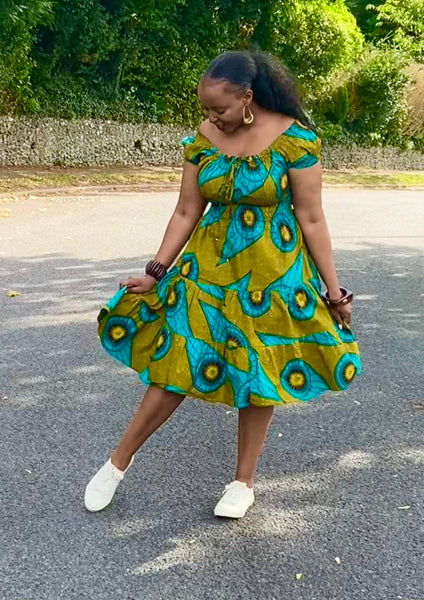 Smocked peasant inspired African print dress.