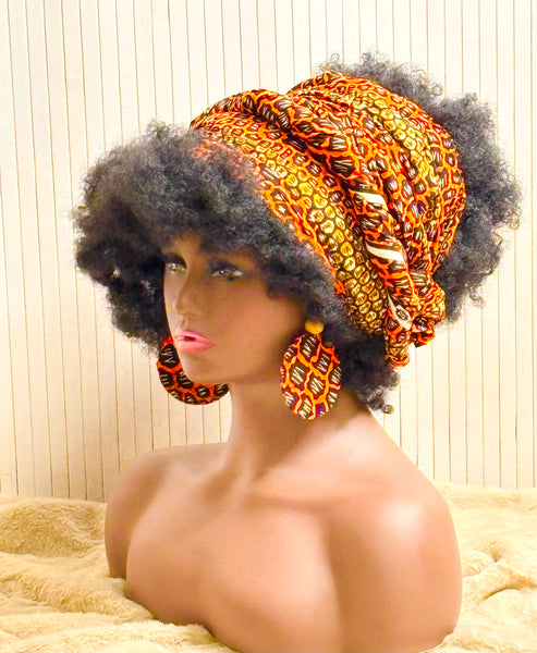 African print head wrap and large disc earrings set in an orange geometric vintage print.