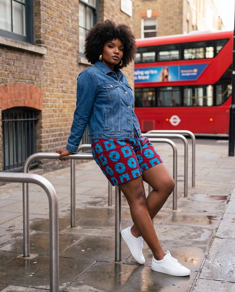 Wide leg shorts in a contemporary geometric African print in turquoise and wine.