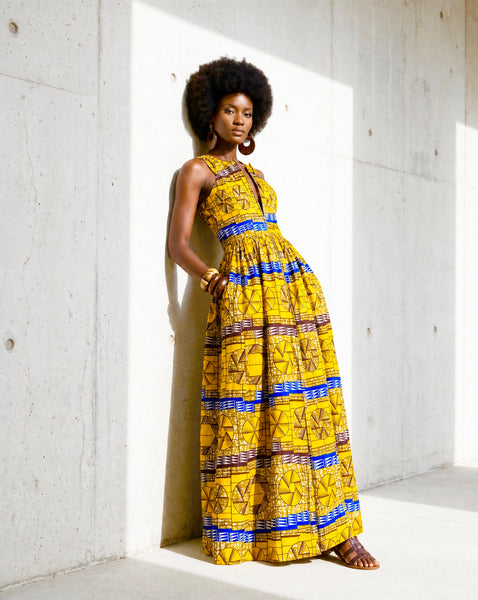 Lola African print smocked sleeveless maxi dress in a vibrant geometric print.