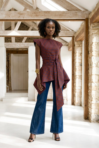 Zena Handkerchief hem peplum top in a vibrant contemporary geometric African print.