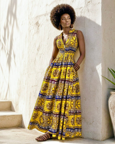 Lola African print smocked sleeveless maxi dress in a vibrant geometric print.
