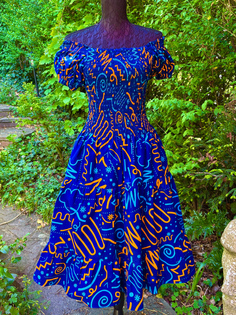 Smocked Ankara dress in blue. House of Afrika Smocked Ankara dress in blue. House of Afrika