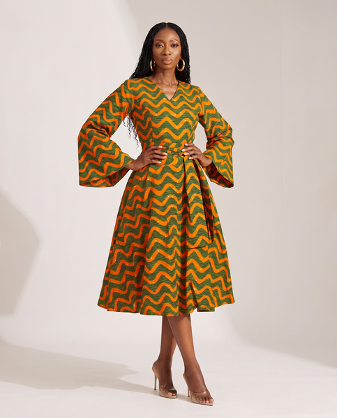 Mina Flared sleeve belted dress in a geometric print.