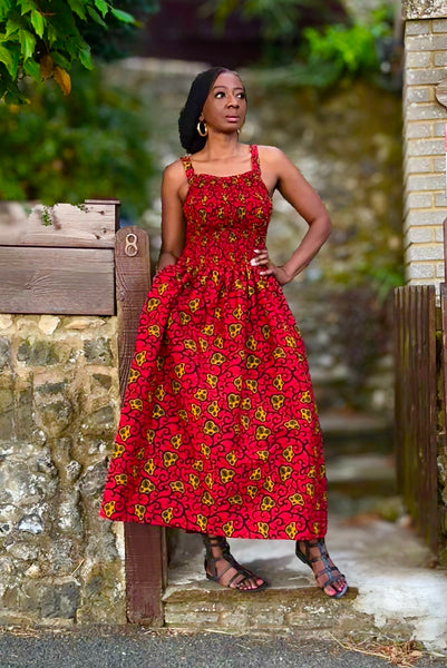 Ladi smocked midaxi dress in red.