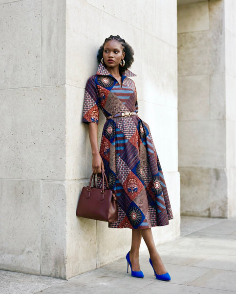 Lira fit and flare three quarter length midi dress.