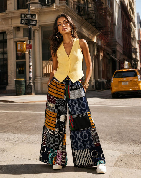 New. Ndini Wide leg one of a kind patchwork African print trousers.