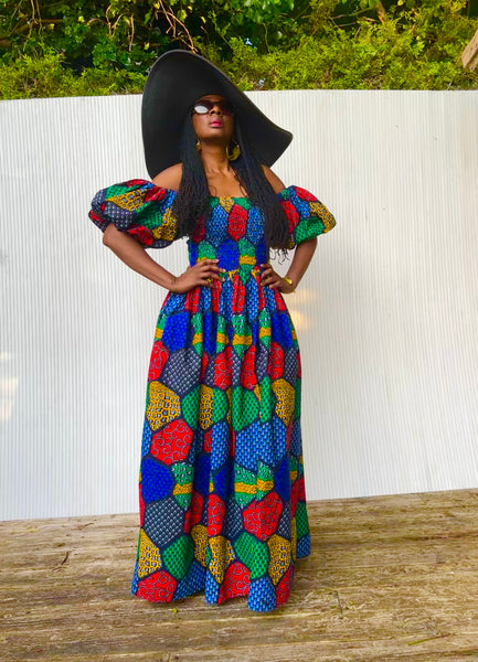 Jaffa statement sleeve maxi dress in a vibrant geometric print.
