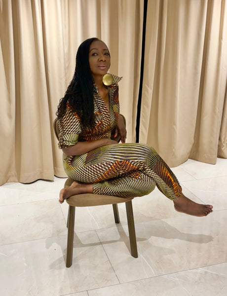 Razi jumpsuit in a geometric contemporary African print.