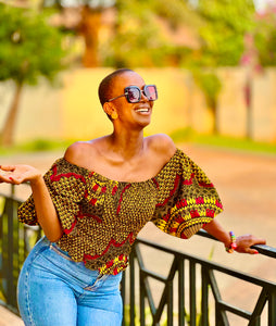 RAHE smocked puff sleeve blouse in brown.