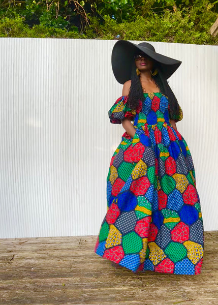 Jaffa statement sleeve maxi dress in a vibrant geometric print.