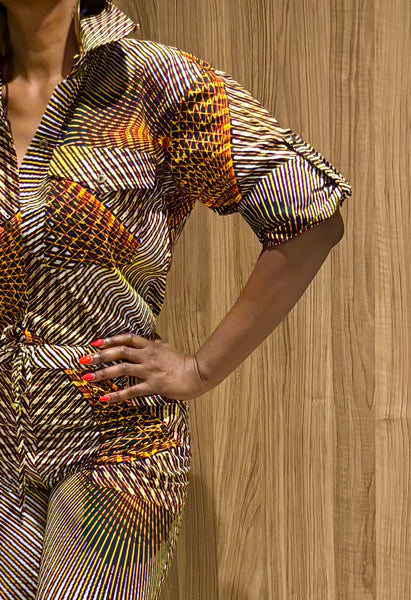 Razi jumpsuit in a geometric contemporary African print.