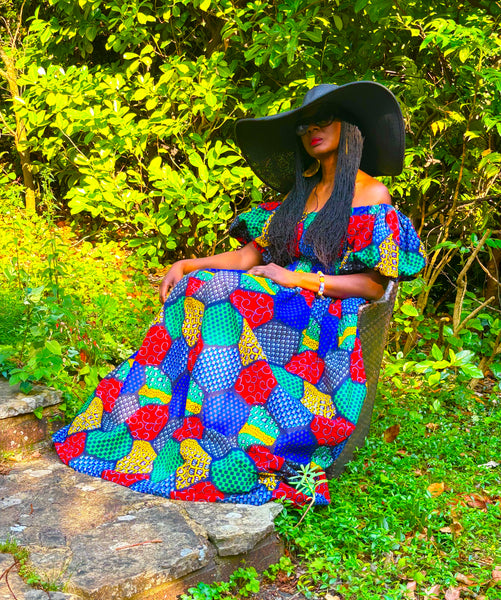 Jaffa statement sleeve maxi dress in a vibrant geometric print.