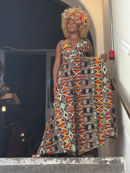 Fula free size infinity jumpsuit in a multi coloured geometric contemporary African print.