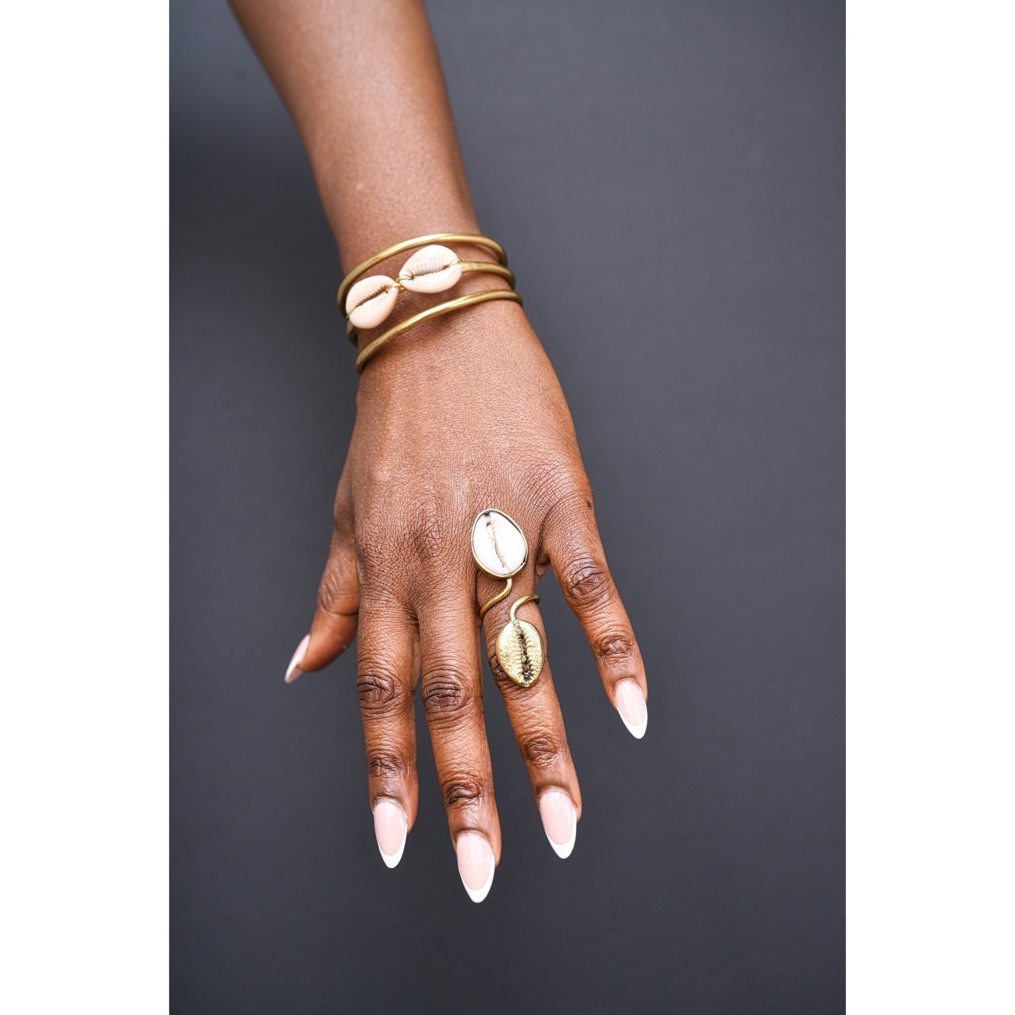 Anya brass and cowrie bracelet and ring set.