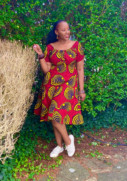 Smocked peasant inspired African print dress.