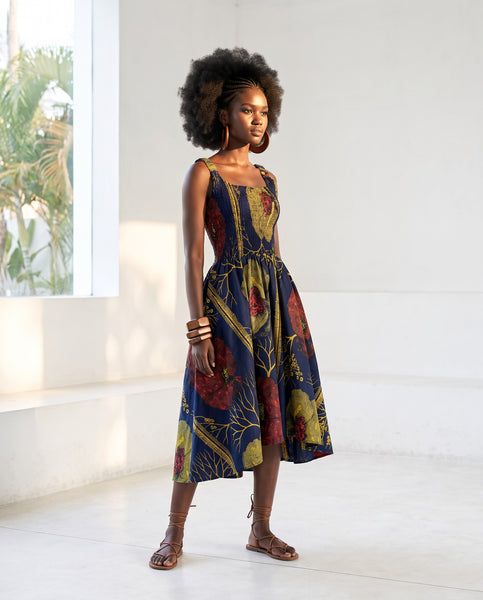 Yiko smocked cut out fit and flared dress,