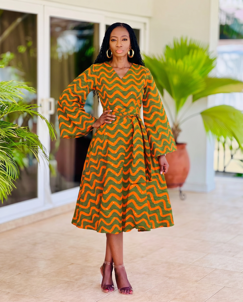 Mina Flared sleeve belted dress in a geometric print.