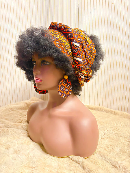 African print head wrap and large disc earrings set in an orange geometric vintage print.