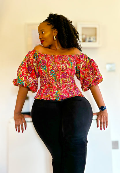 RAHE African print statement puff sleeve blouse.