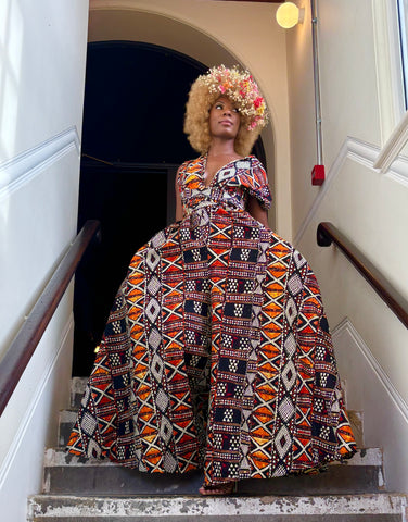 Fula free size infinity jumpsuit in a multi coloured geometric contemporary African print.