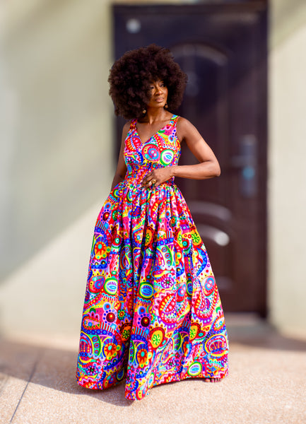 Fatu full skirt dress in multicoloured abstract pattern.