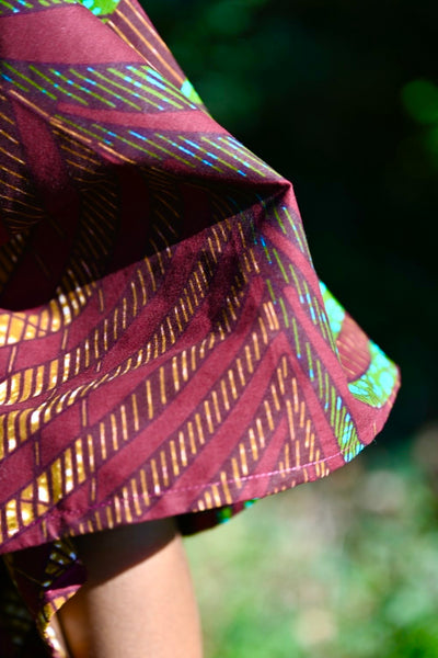Button down Boubu in a deep brown with dashes of green.