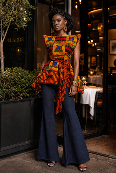 Zena Handkerchief hem peplum top in a vibrant contemporary kente print.