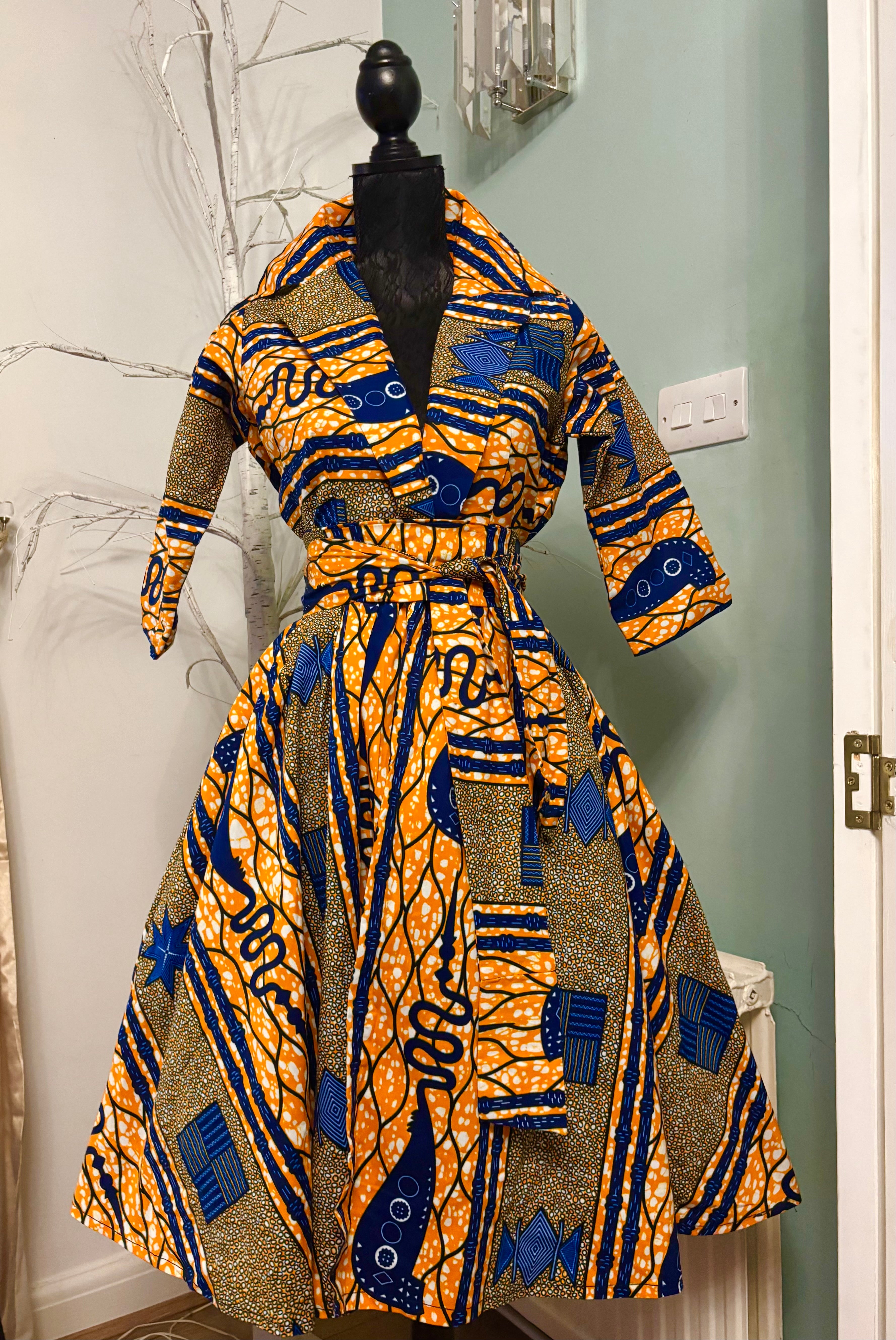Kayla 50’s shirt style dress in a bold contemporary geometric African print.