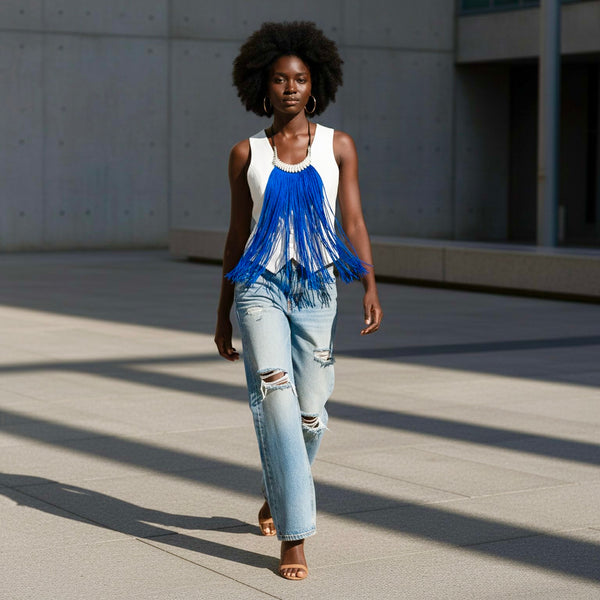 Blue statement long fringe necklace embellished with cowries.
