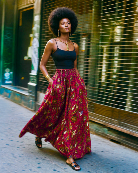 African print maxi skirt in red with botanical motifs.